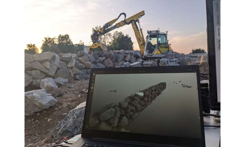 Autonomous excavator constructs a 6-meter-high dry-stone wall