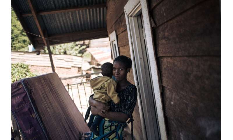 Fragile home: Sarah, 24, and her 16-month-old child