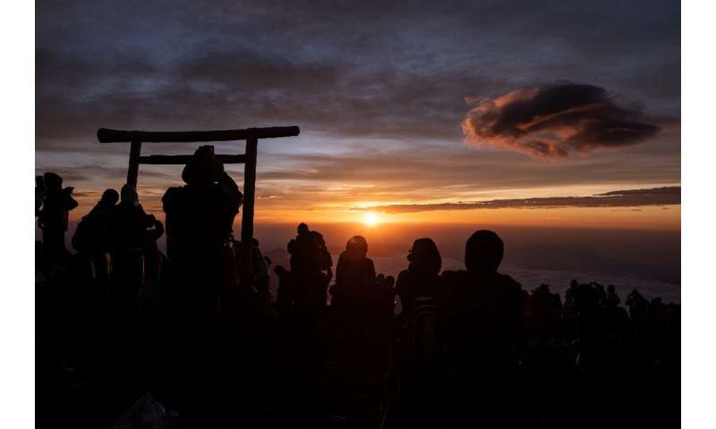 Hundreds of thousands of climbers often trek through the night to see the sunrise each year