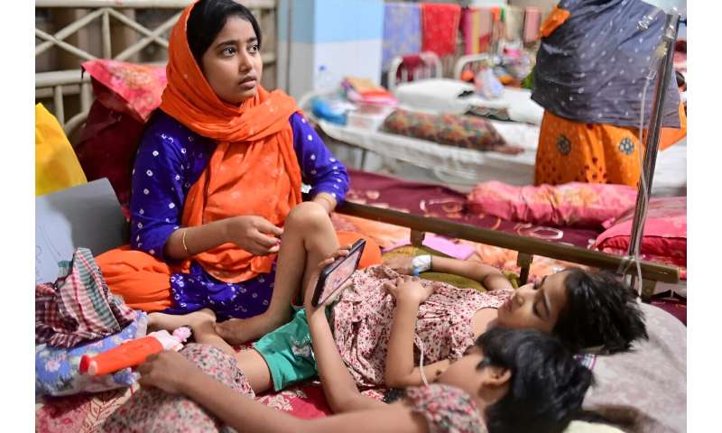 In the crowded fever ward in Bangladesh's Mugda hospital every bed is taken, as the country struggles in the grip of its deadliest dengue outbreak