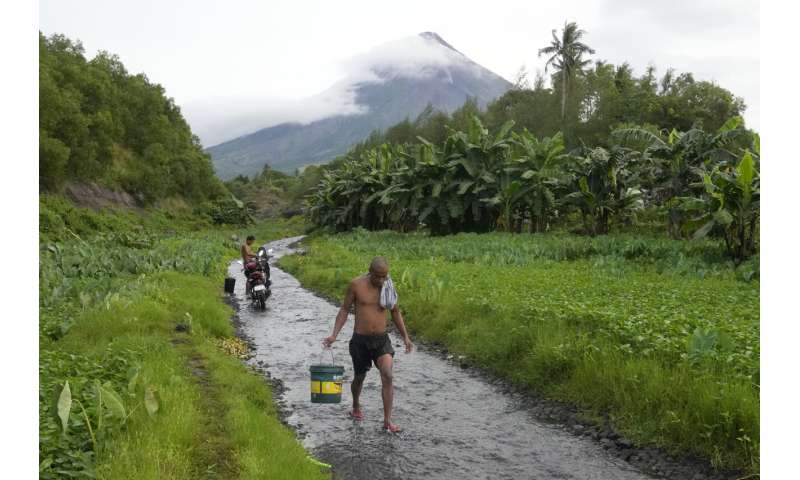 Most active Philippine volcano spews lava, locals ready to evacuate in event of explosion