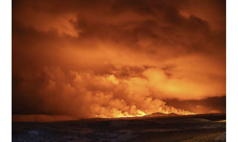 Photos: Rivers and fountains of red-gold volcanic lava light up the dark skies in Icelandic town