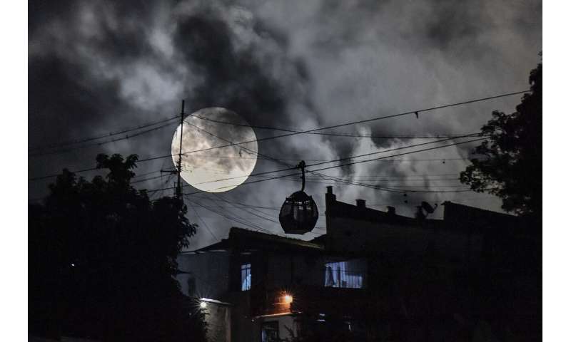 Photos: The first supermoon in August rises around the world