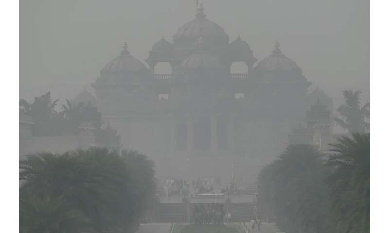 The Akshardham temple is surrounded by heavy smog conditions in New Delhi