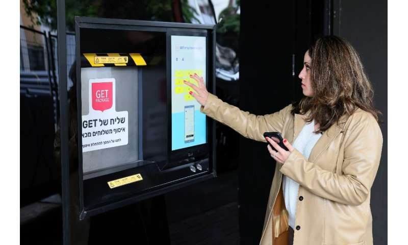 The robot toils in the custom-made space, fitted with a streetside hatch for couriers and shoppers to collect online orders