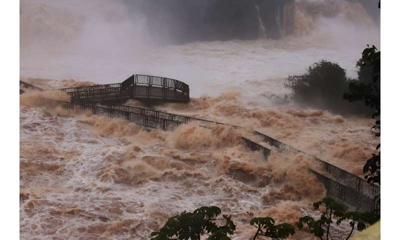 Tourist access to the Iguazu falls between Brazil and Argentina has been shuttered due to dangerous water levels