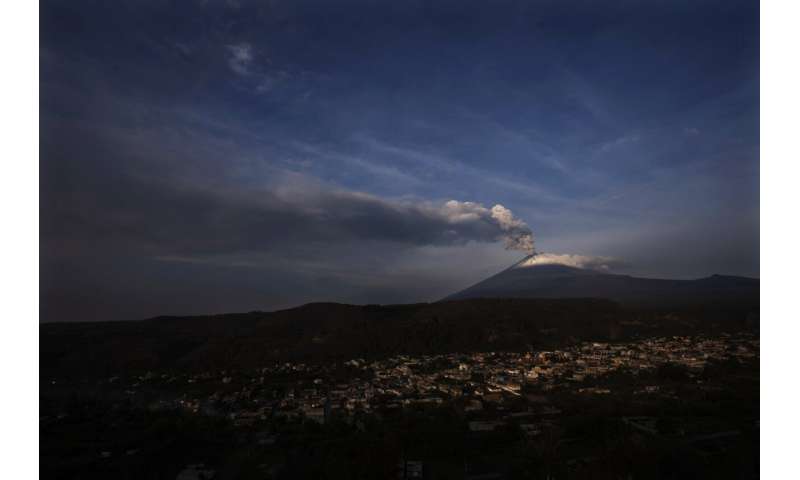 Volcano rumbles near Mexico City, coating towns with ash, disrupting flights