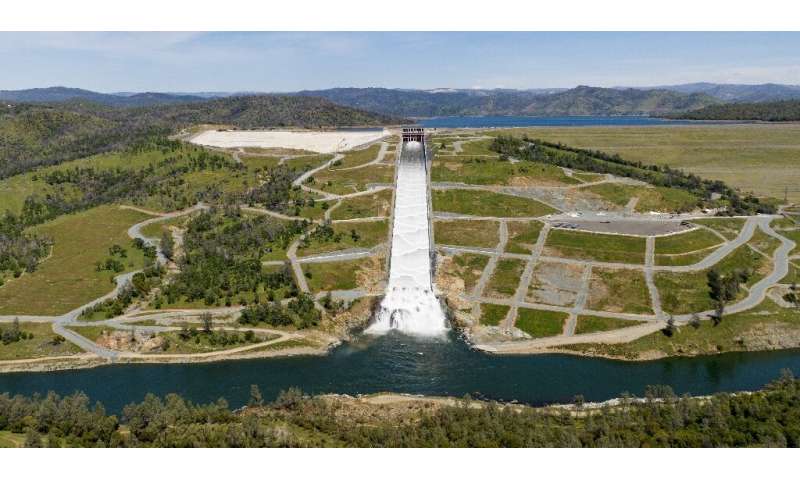 Water is released from Lake Oroville down a spillway