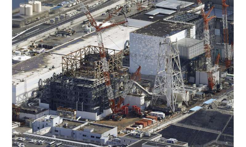 A robot's attempt to get a sample of the melted nuclear fuel at Japan's damaged reactor is suspended