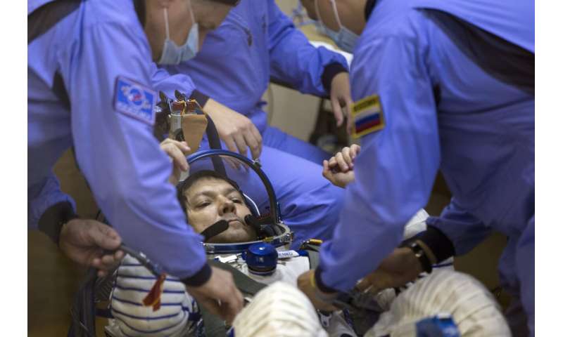 A Russian cosmonaut sets a new record for the most time in space