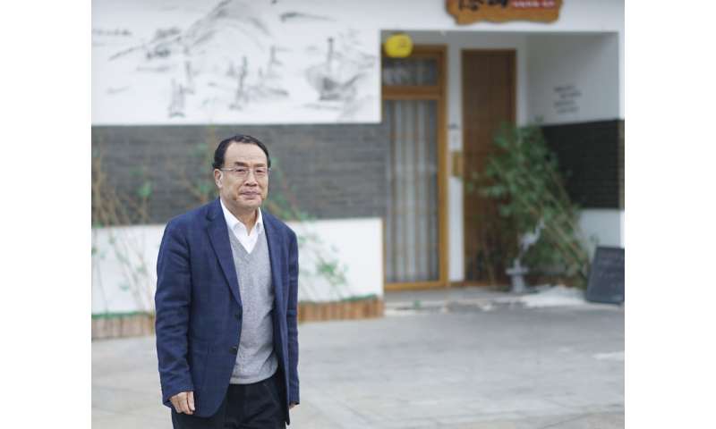 Chinese scientist who published COVID-19 virus sequence allowed back in his lab after sit-in protest