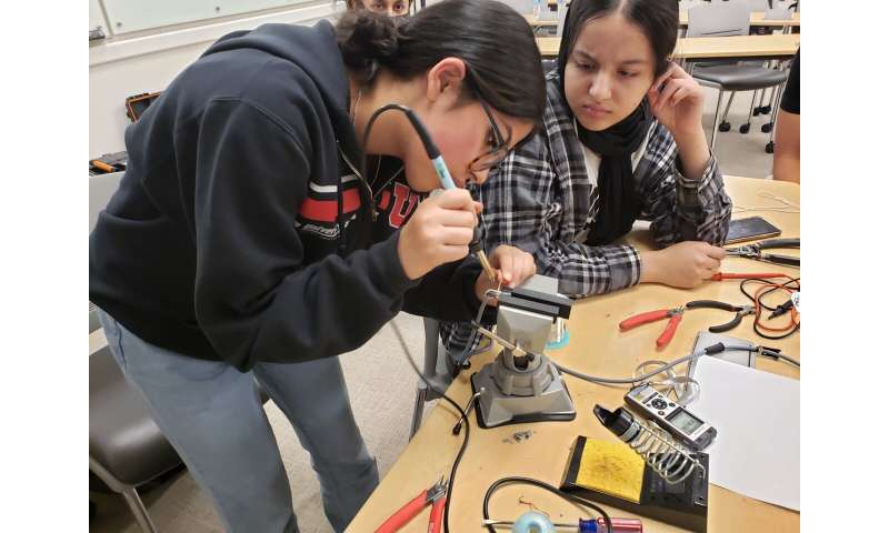 Cosmic ray detectors, built by Utah refugee teens, installed on Refugee Services Center