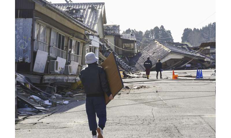 Death toll from western Japan earthquakes rises to 126 as rain and snow imperil already shaky ground