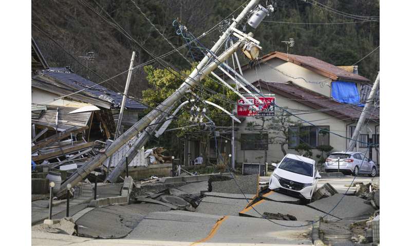 Death toll from western Japan earthquakes rises to 126 as rain and snow imperil already shaky ground