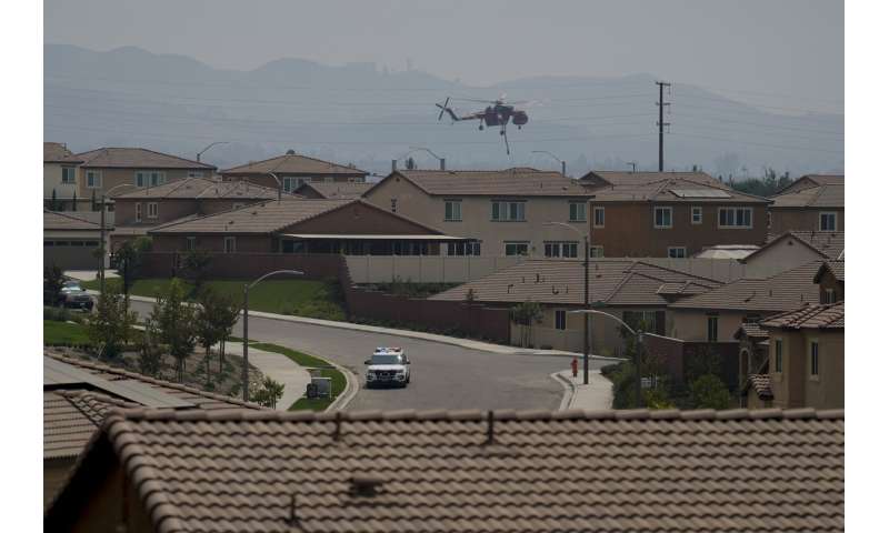 Evacuations ordered as wildfire burns in foothills of national forest east of LA