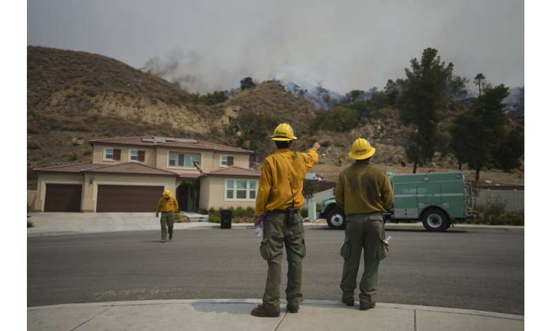 Evacuations ordered as wildfire burns in foothills of national forest east of LA