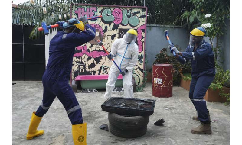 How do you deal with stress? In Nigeria, swinging a sledgehammer in a 'rage room' helps