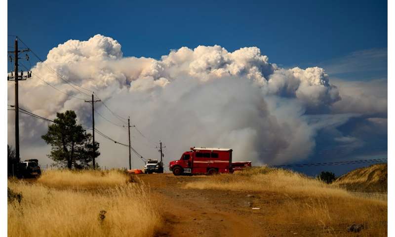 Smoke rises as the Park Fire continues to burn near Chico, California on July 26, 2024