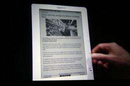 Amazon.com offers new lower-priced Kindle DX (AP)