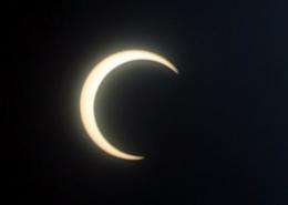 An annular eclipse occurs when the Moon passes in front of the Sun but does not completely obscure it