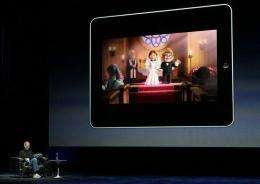 Apple Inc. CEO Steve Jobs demonstrates the movie function of the new iPad