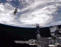 Astronauts make a last inspection of Atlantis (AP)