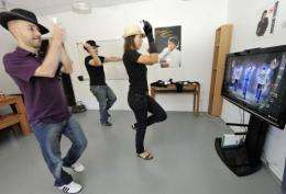 French videogame company Ubisoft employees play a video game called "Michael Jackson The Experience"