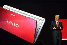 Sir Howard Stringer shows a pocket-sized Sony Vaio computer