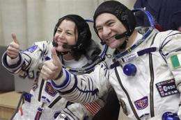Soyuz crew blasts off on space station mission (AP)