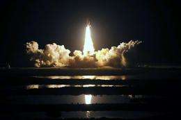 The space shuttle Discovery lifts off from the Kennedy Space Center in Florida