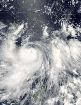 Tropical Storm Conson sweeping through the Northern Philippines