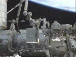 Astronauts take 1st spacewalk of shuttle mission (AP)
