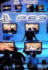 Attendees play video games at the Sony Playstation booth