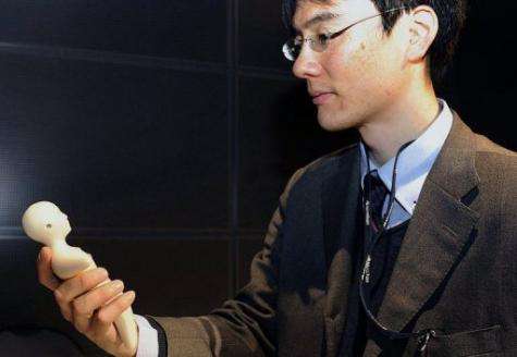 Japanese researchers developed a human-shaped mobile phone with a skin-like outer layer