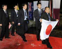 Members of the Japanese delegation arrive to the FIFA headquarters in Zurich