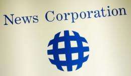 News Corporation's Chief Executive, Rupert Murdoch, plans to begin charging online readers of all his newspapers