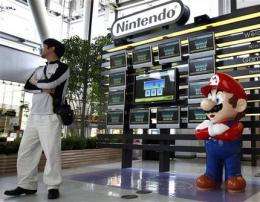 Nintendo profit drops for first time in 6 years (AP)