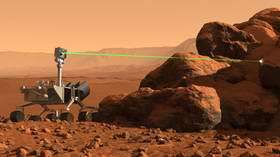 Mars Science Laboratory rover using ChemCam to analyze a rock