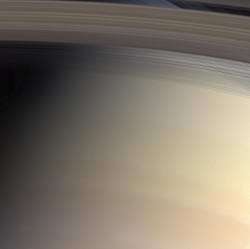 Strings of Shadowy Rings Drape Saturn