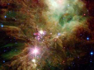 Spitzer Unveils Infant Stars in the Christmas Tree Cluster