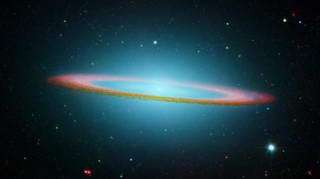 This new image of Messier 104, the Sombrero galaxy, combines a recent infrared observation from NASA's Spitzer Space Telescope w