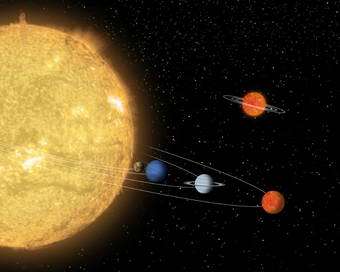 A Planet With Planets? Spitzer Finds Cosmic Oddball