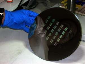 SOI 200mm wafer processed on a standard CMOS fabrication line with numerous nanophotonic circuits