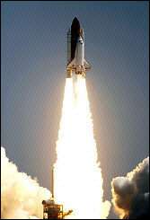 Space Shuttle Discovery lifts-off