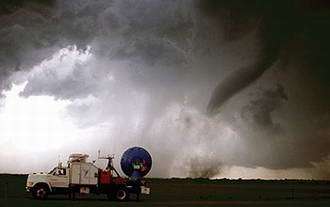Rapid-Scanning Doppler on Wheels Keeps Pace with Twisters