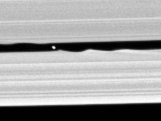 Cassini finds new Saturn moon that makes waves