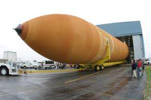 Space shuttle external tank ET-119 rolls out at NASA's Michoud Assembly Facility near New Orleans