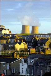 Steam rises from cooling towers at the Sellafield nuclear plant in northern England
