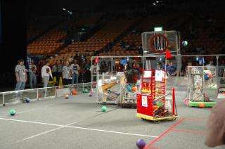 Student-build robots compete in FIRST's regional basketball tournament