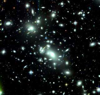 'Cosmic Telescopes' May Have Found Infant Galaxies